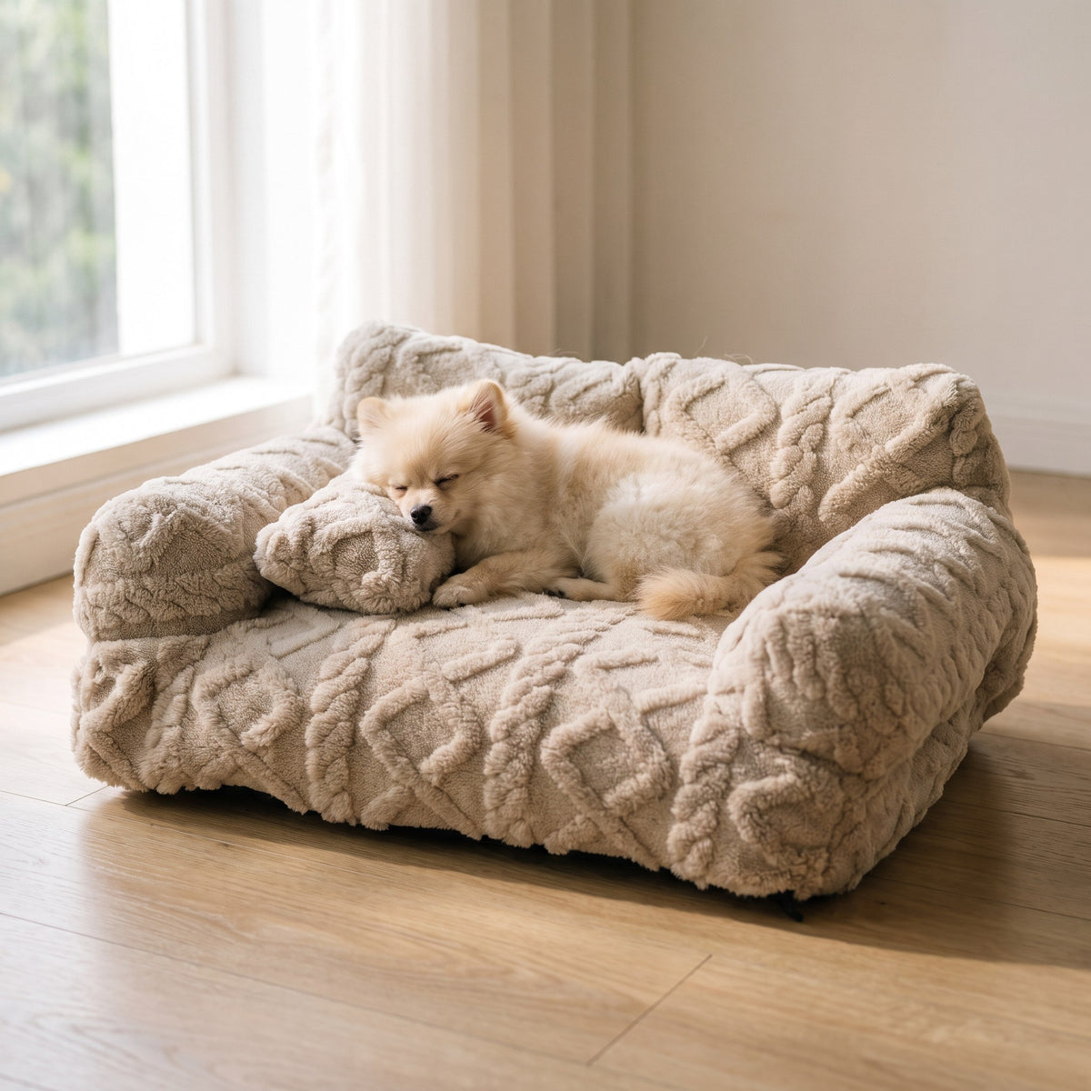 Small puppy asleep on the Fleecy plush sofa bed