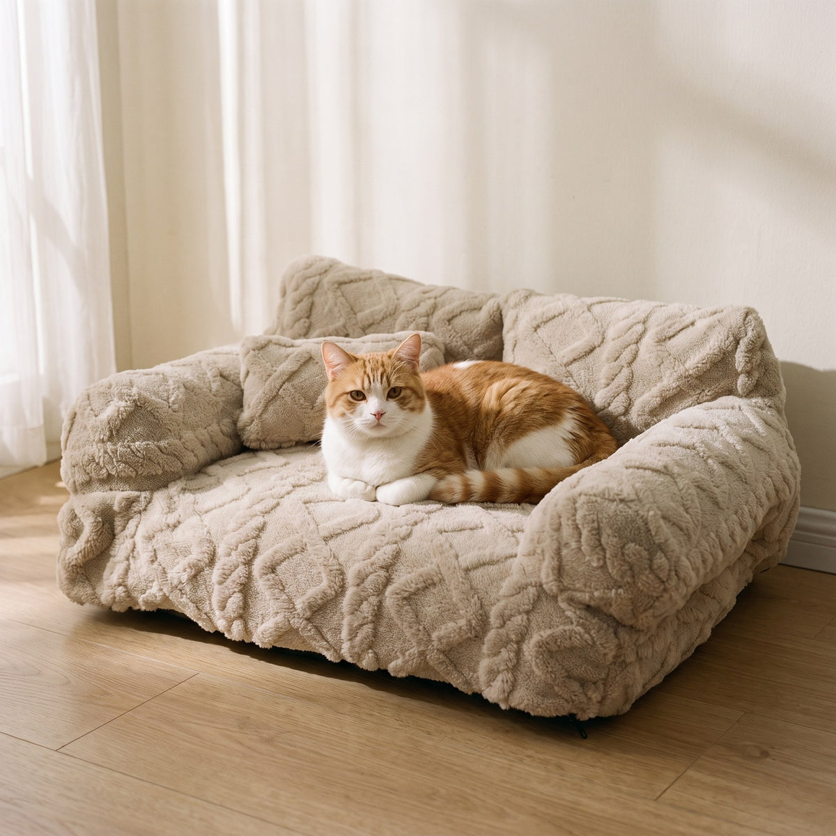 Cat resting on the plush sofa pet bed